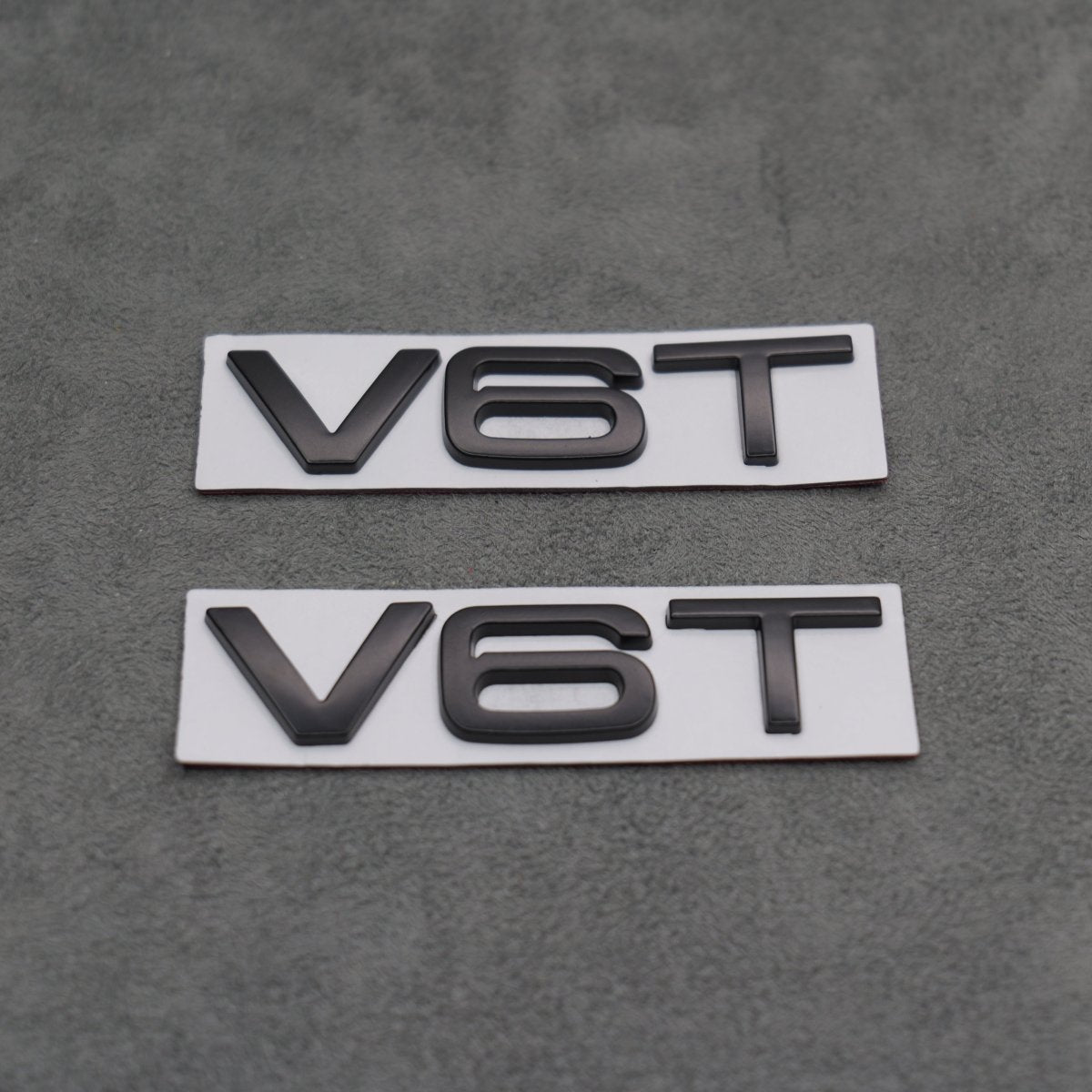 2x Matte Black V6T Side Wing Badge Emblems for Audi A4 A5 A6 A7 S3 S4 S5 S6 Q5 Q7 V6 - Exterior Styling | Carbon Kings