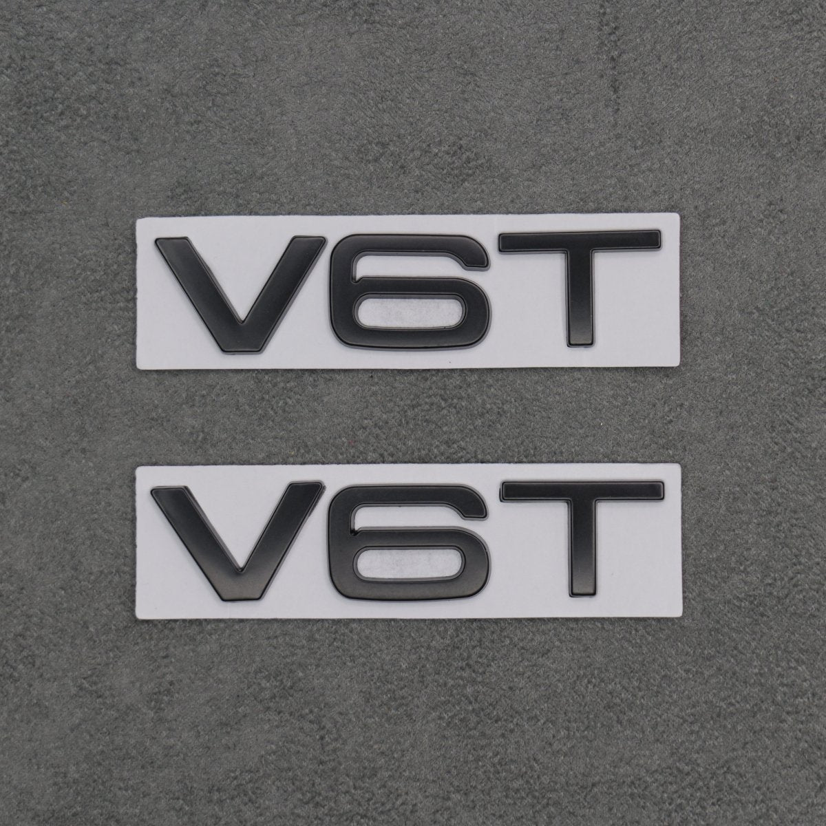 2x Matte Black V6T Side Wing Badge Emblems for Audi A4 A5 A6 A7 S3 S4 S5 S6 Q5 Q7 V6 - Exterior Styling | Carbon Kings